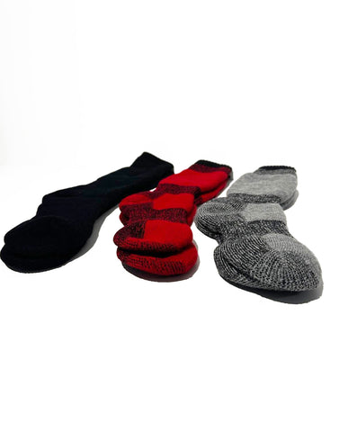 Merino wool socks in (black, red, graphite) laying in a lateral row against a white background