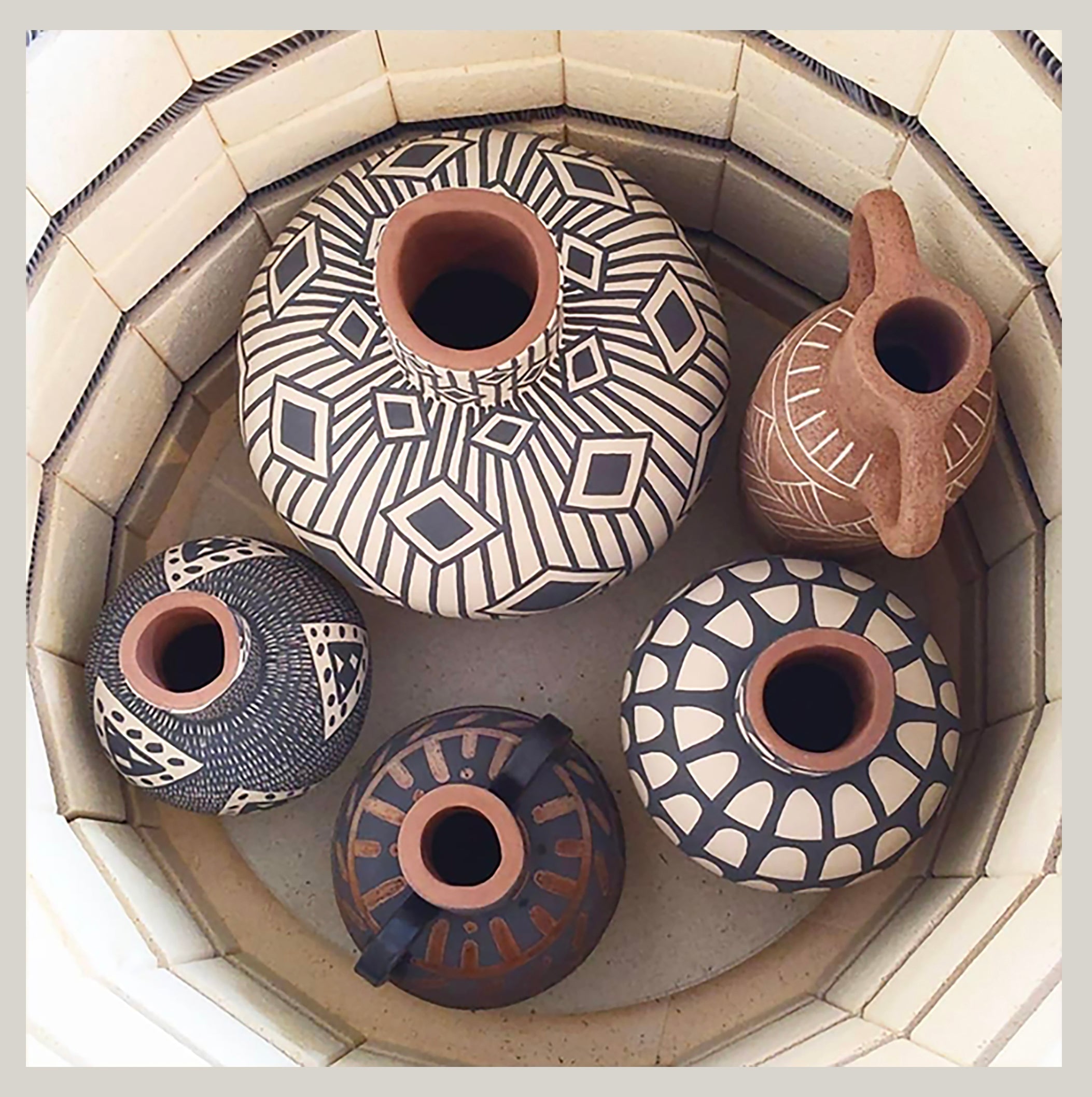 Pots waiting to be fired in kiln