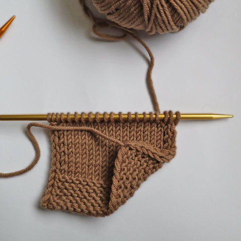Repeat these 4 steps along the entire length of the knitted piece.