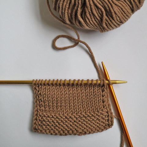 Step 1: Knit the first 2 stitches.