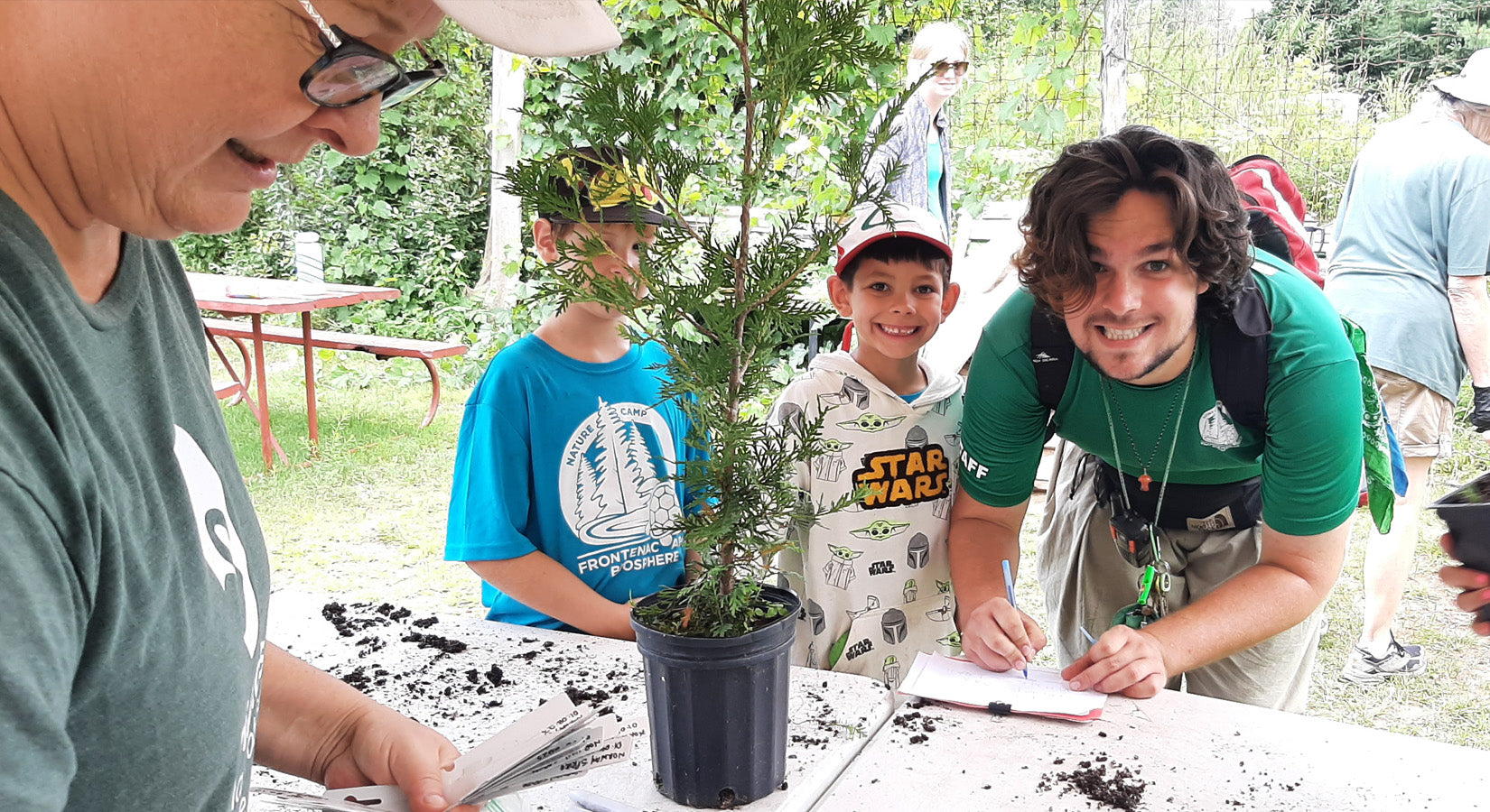 summer camp participants at the tree nursery