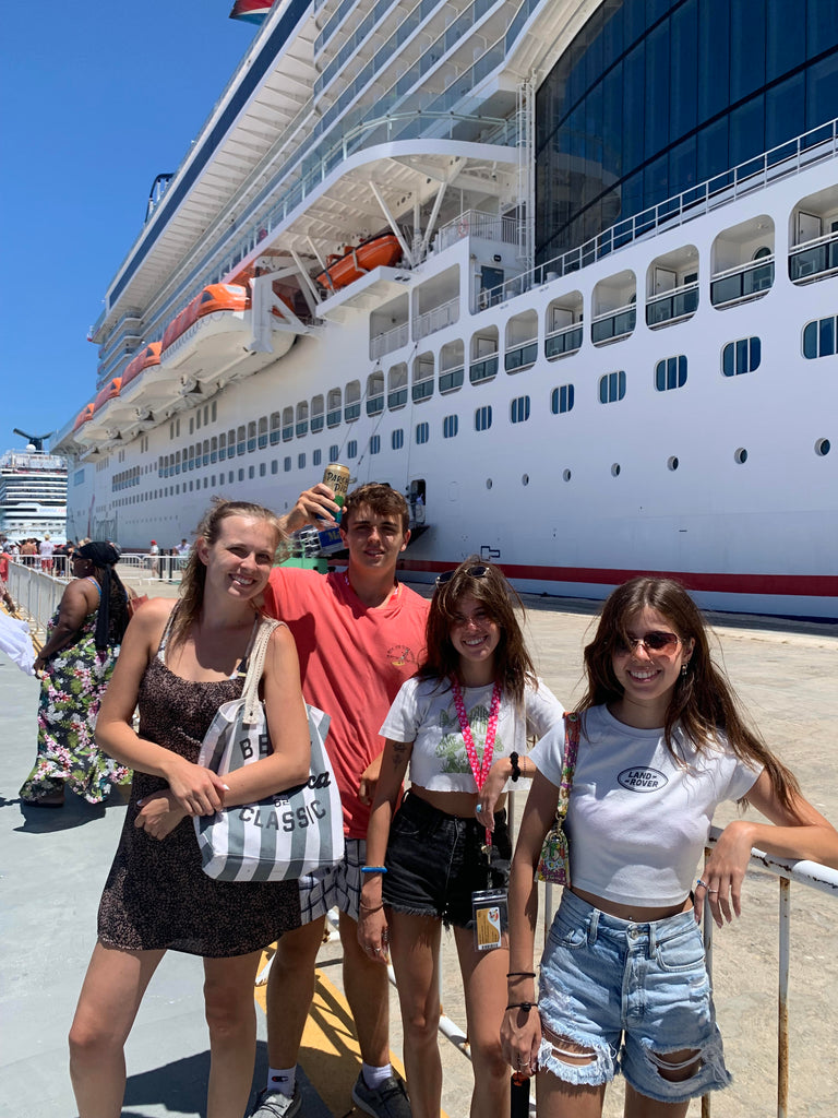 The crew in front of Carnival Cruise Ship