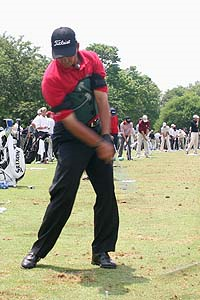 Image of golfer wearing the Swing Jacket