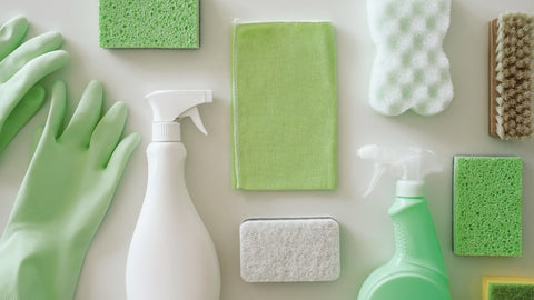 Green and white cleaning supplies