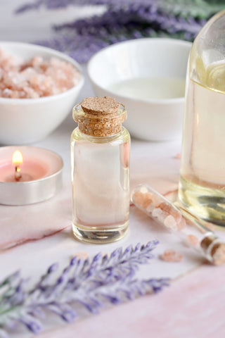 Lavender oil and lavender buds.