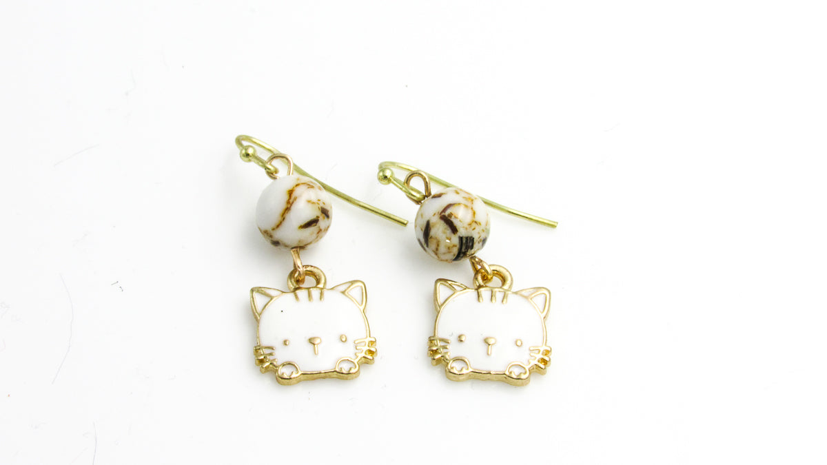 Kimora Lee Simmons for Sanrio Hello Kitty Gold and Diamond Earrings at  1stDibs | hello kitty diamond earrings, hello kitty earrings, hello kitty  gold earrings