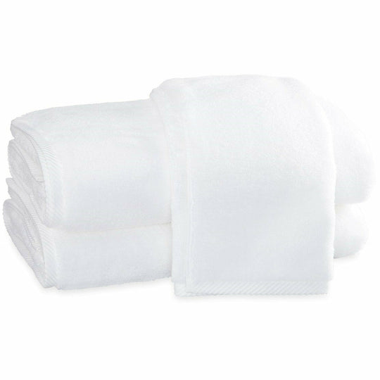 https://cdn.shopify.com/s/files/1/0497/1809/products/Milagro_towels_white_secondary_540x.jpg?v=1673431892