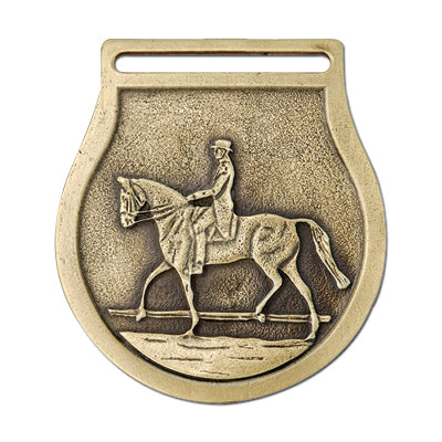 Dressage rider with horse, gold medal