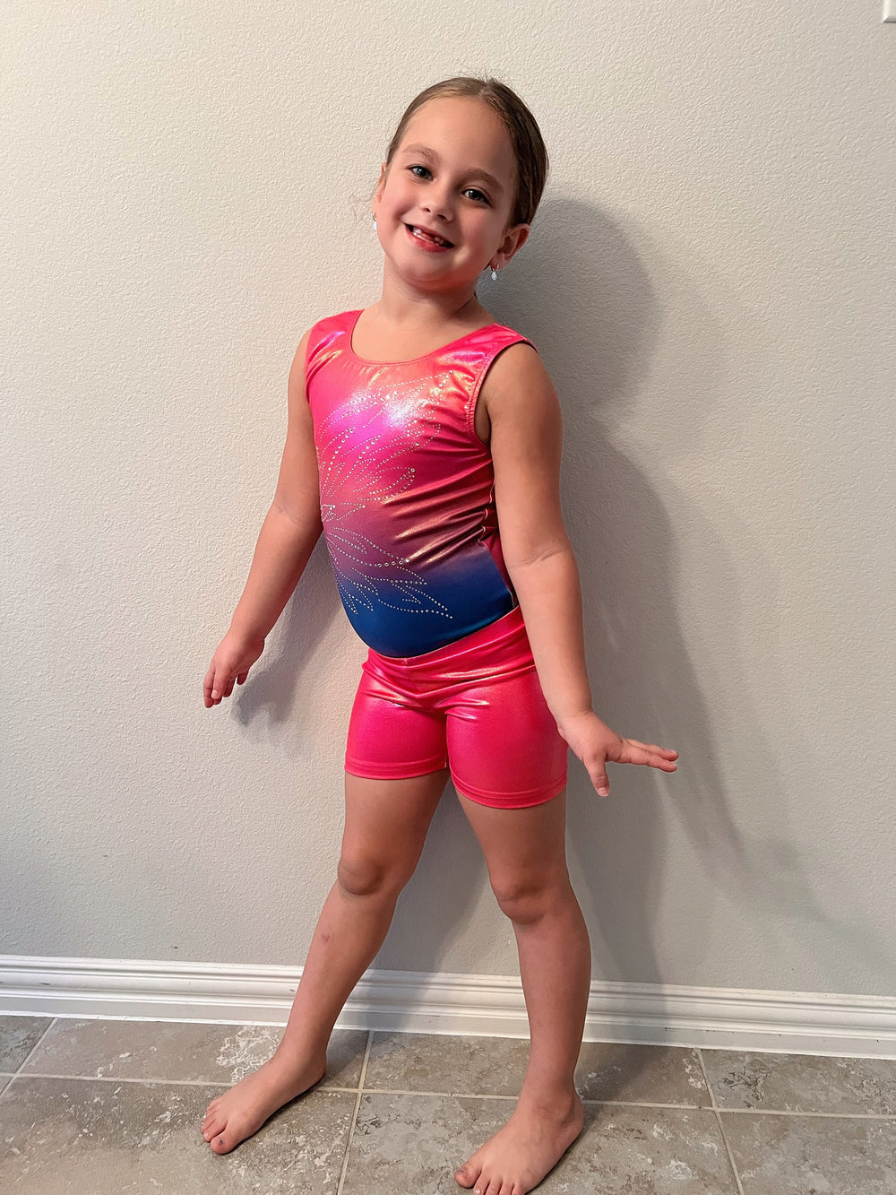 7 Year Old girl wears Child size M leotard with shorts