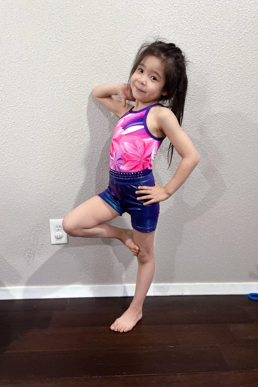 JOYSTREAM gymnastics star wears violet open back gymnastics leotard outfit set