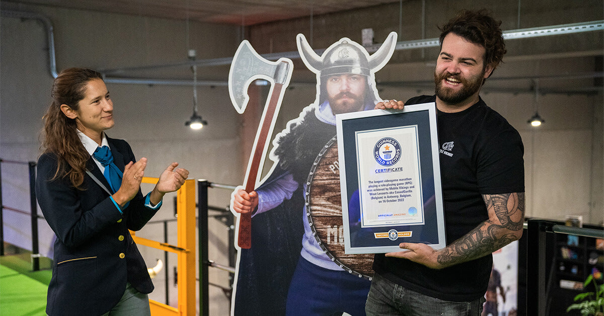 Wout Lenaerts holding the official Guinness World Records™ certificate, handed over
by an official adjudicator.