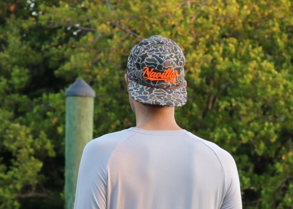 Model wearing the vintage camo rope cap.