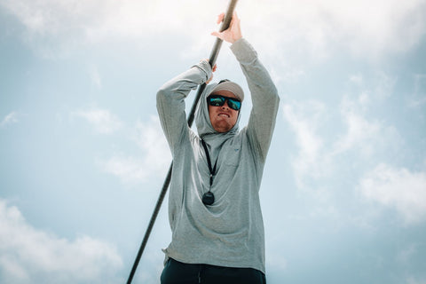 Model wearing the Angler Crossover Bamboo Sun Hoodie.