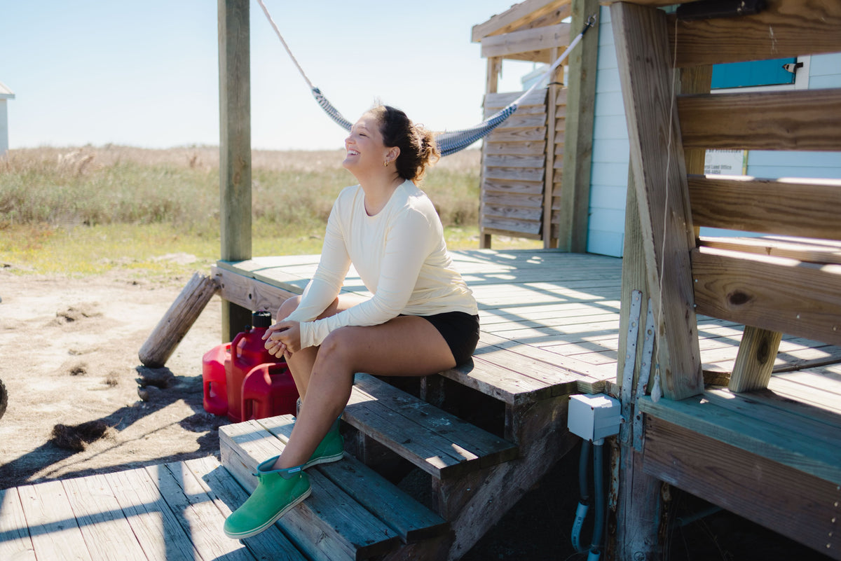 Model wearing the women's lightweight long sleeve bamboo shirt.