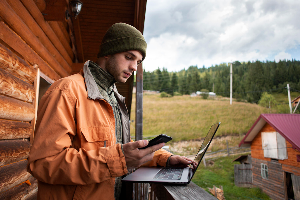 A homeowner monitoring energy usage in off grid house