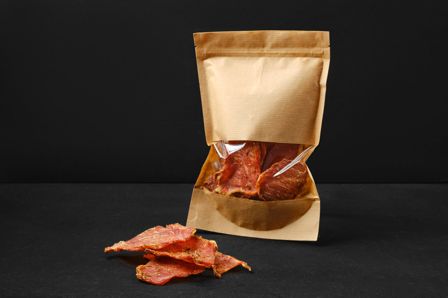 Sealed bags with beef jerky inside.