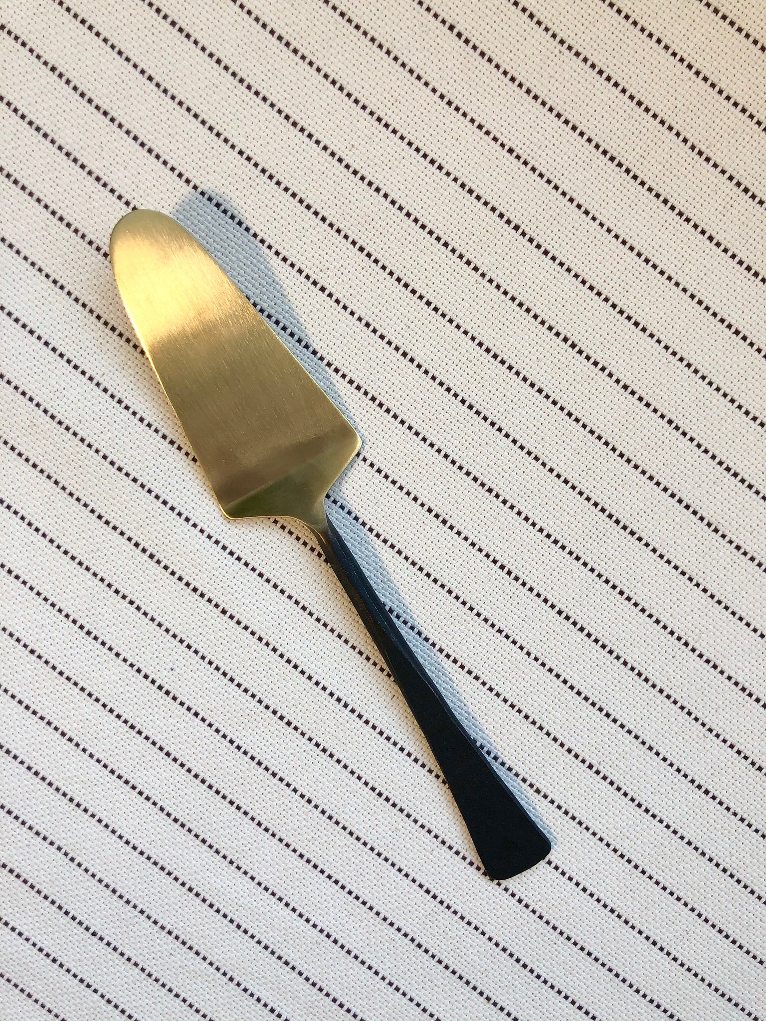 Gold Lifter with Black Handle