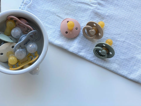 Cleaning pacifiers