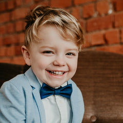 cute boy with blue cork bow tie