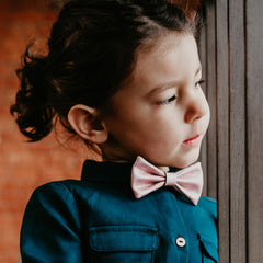 cute girl with pink cork bow tie