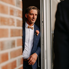 man wearing cork bow tie for wedding