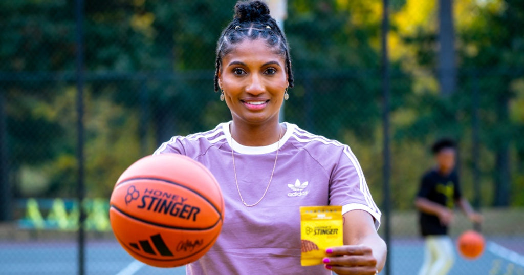 Angel McCoughtry with Honey Stinger waffle and signed basketball