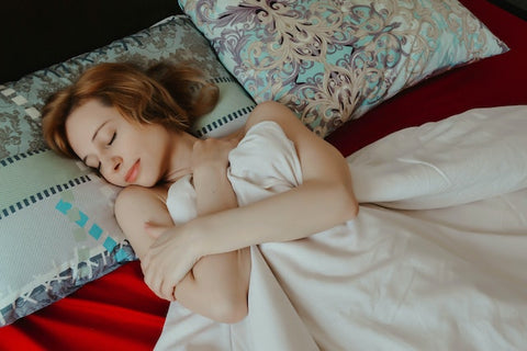 Woman asleep in bed