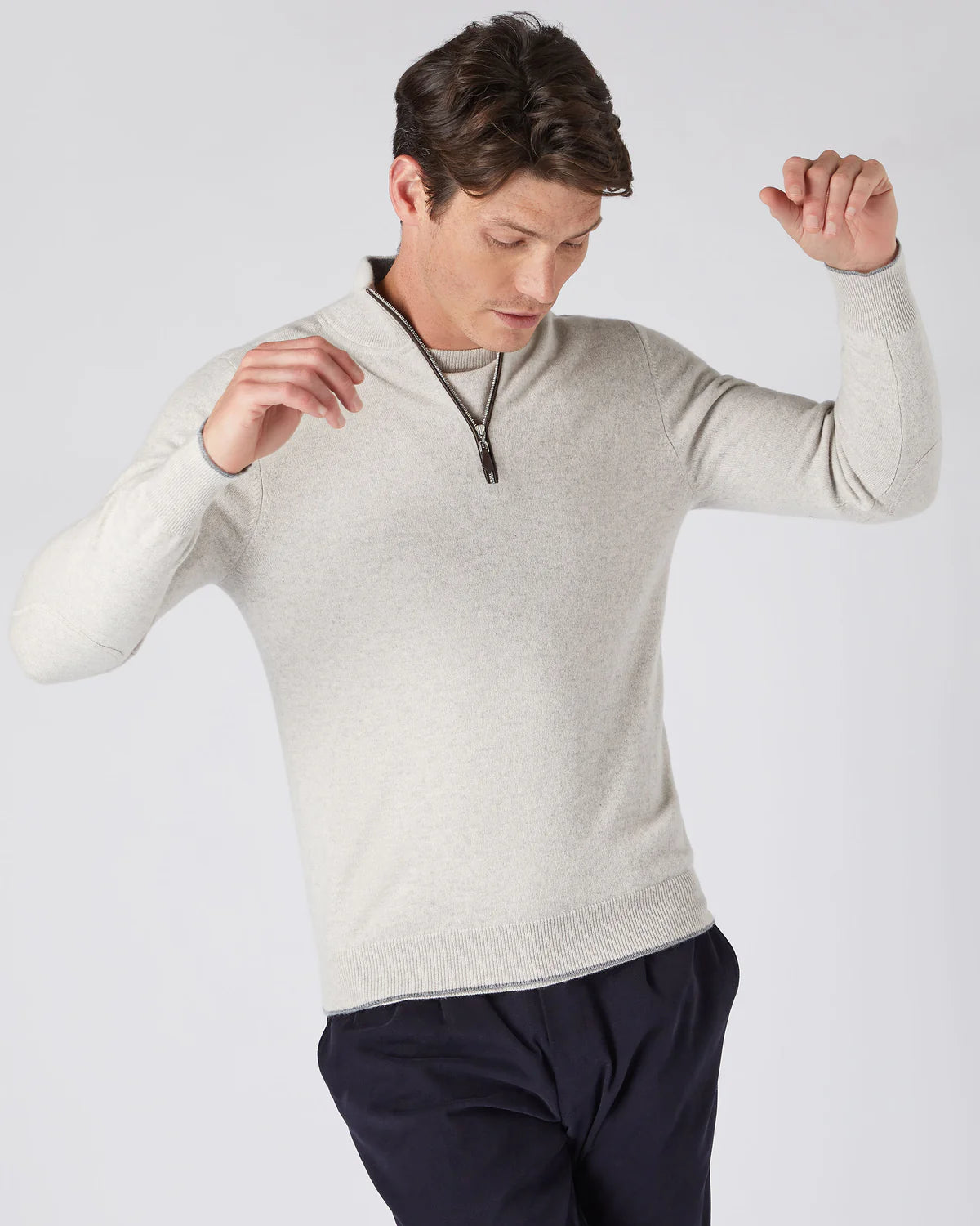 Man in white quarter-zip jumper