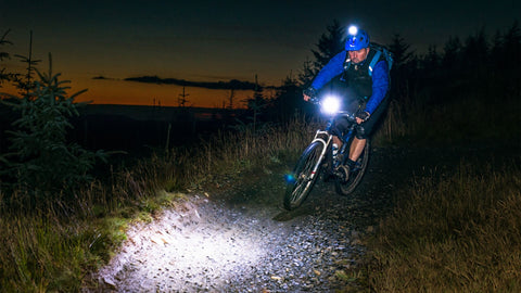 Mountain bike riding at night.