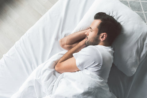 Man sleeping on foam pillow