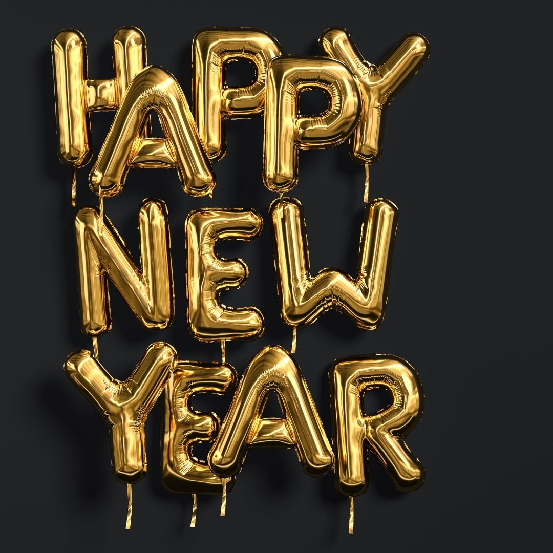 The Words "Happy New Year" Written in Golden Balloons Against a Black Background.