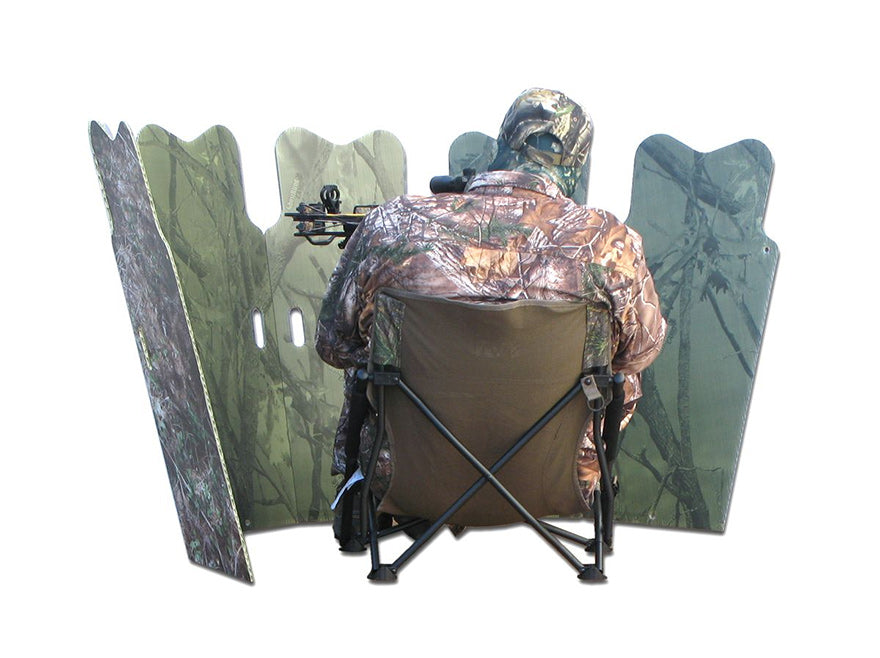 a back view of a hunter sitting behind a ground blind