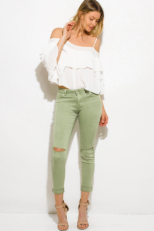 green ripped skinny jeans