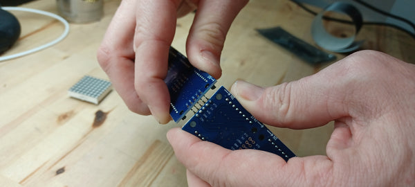 Angling the LED displays can help fit the through holes to the connection