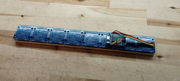 ESP8266 on top of the LEDs, all wired up.