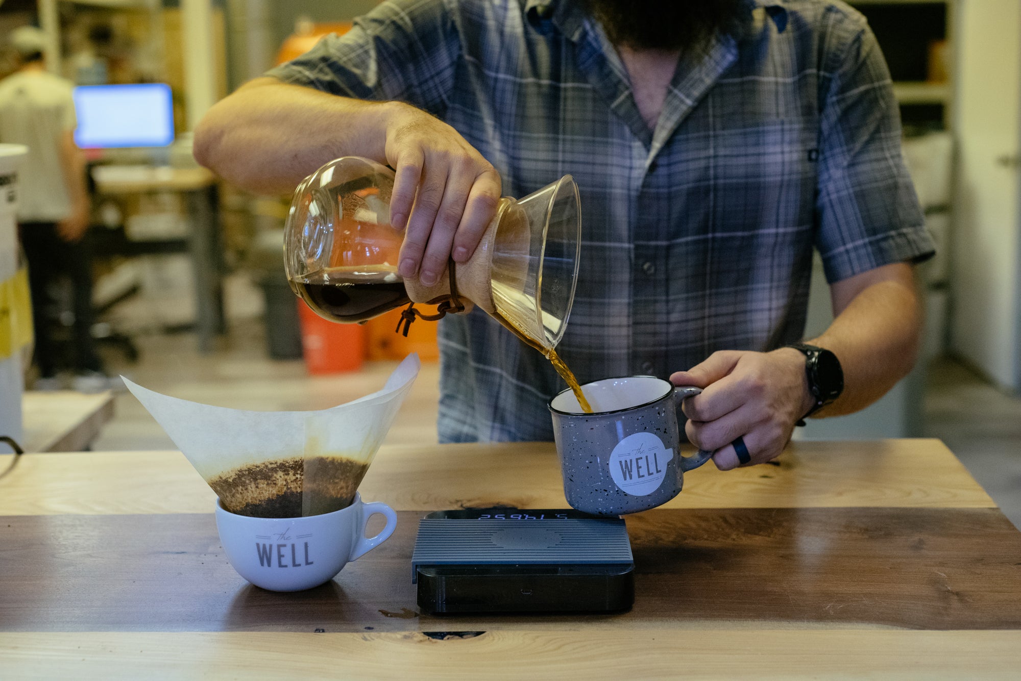Pouring Final Coffee Product into Mug