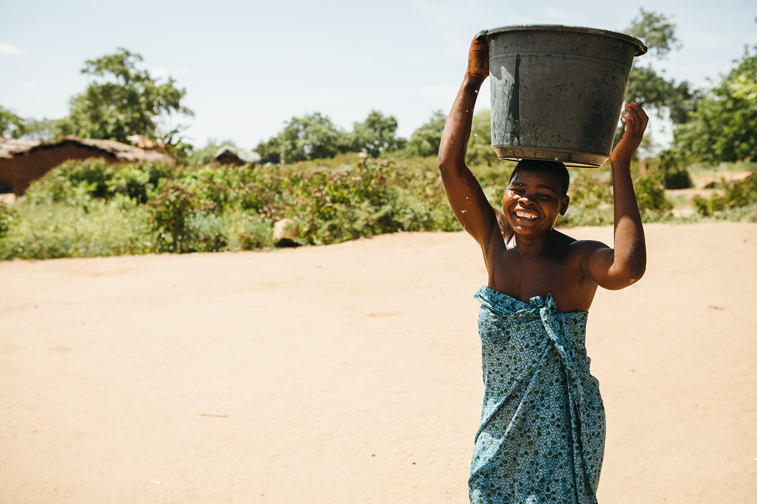 Woman Carrying Water