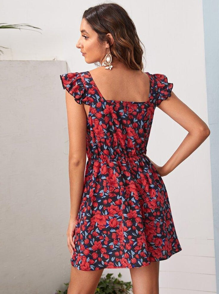 Sleeveless red and blue floral mini dress with elastic at waist and ruffle at shoulder - Back view