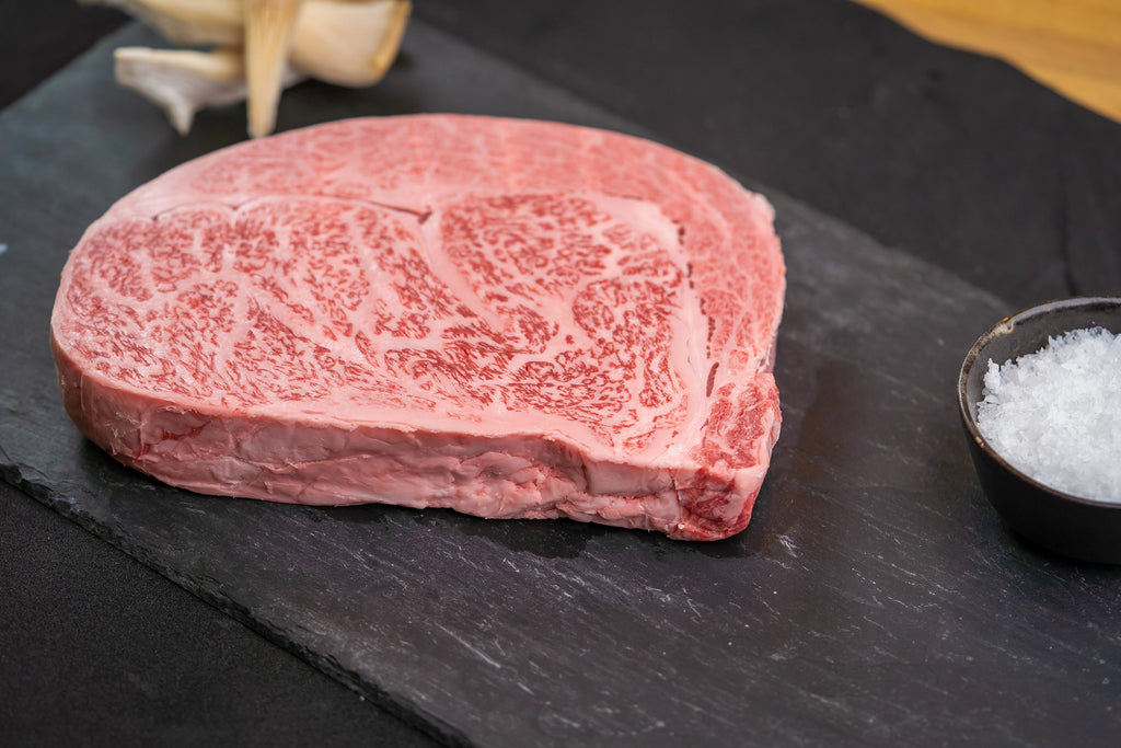Picture of Japanese Wagyu beef with a bowl of salt