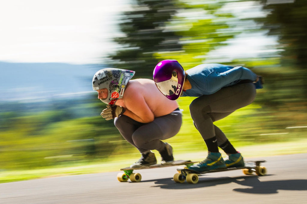 Open Class Racers in the "Old School Tuck" – Feet overlapping with knees together.