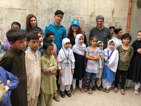 Huma Adnan with the children at the UNHCR refugee camp