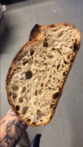 crunchy outside, soft inside of sourdough bread