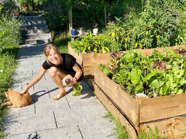 Eva is harvesting homegrown food