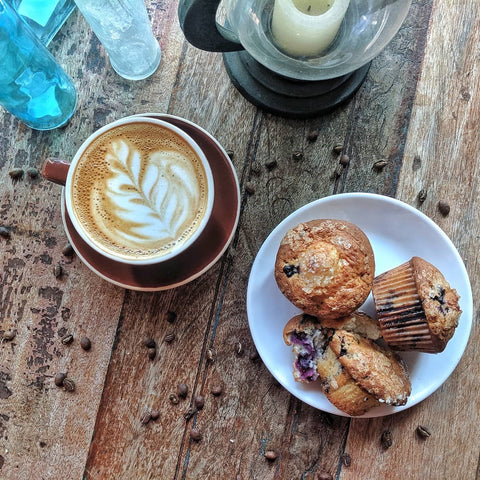 coffee shop latte and paleo blueberry muffin