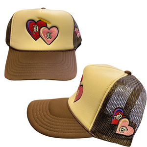 brown and cream trucker hat