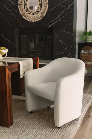 The Harper Accent Chair styled in a modern boho living area.