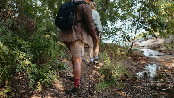 A duo of hikers takes on the great outdoors with Boomhi socks on their feet.