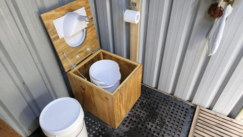 Water saving dry compost toilet with urine diverter