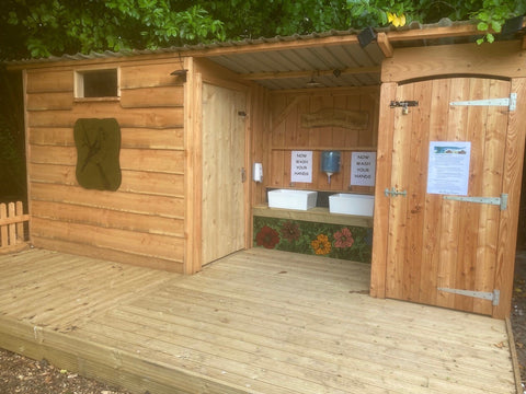 Outdoor compost toilet facility primary school 