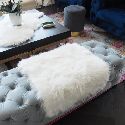 faux fur rug on a bench